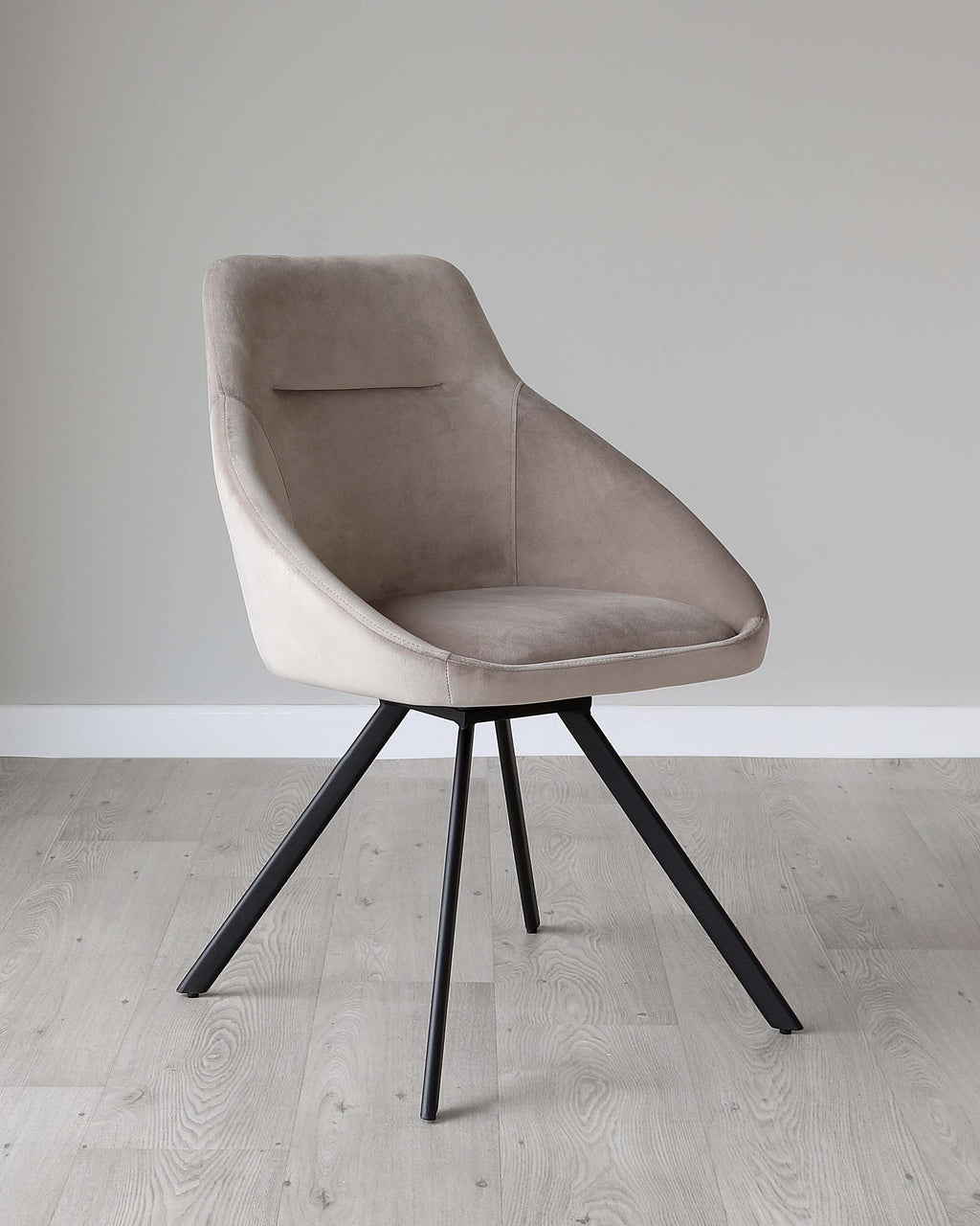 Fauteuil pivotant Cleo en velours champagne