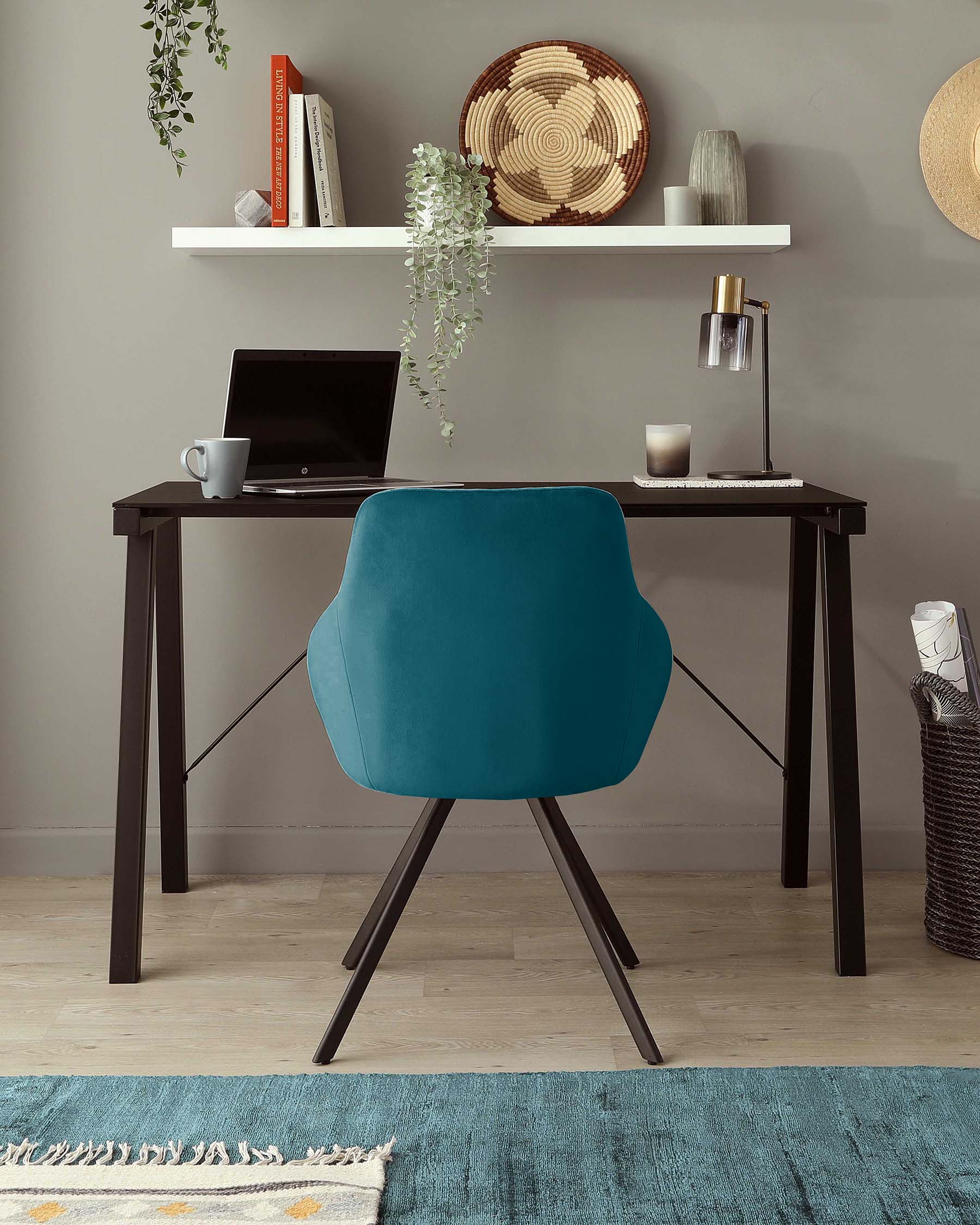 Fauteuil pivotant Cleo en velours bleu sarcelle foncé