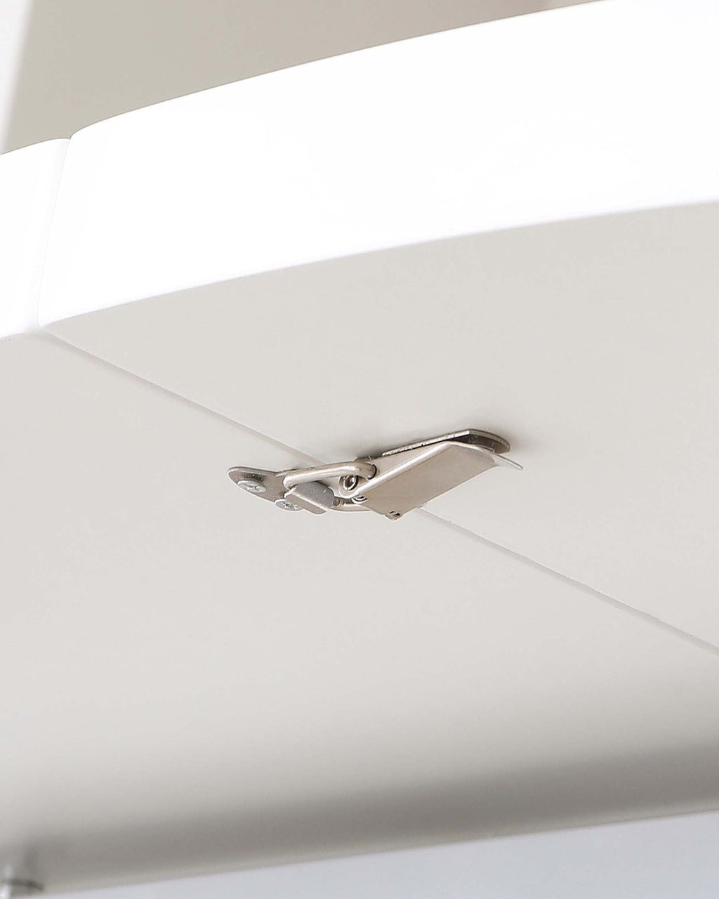 Table de salle à manger ronde extensible Curva blanche brillante 4 à 6 places