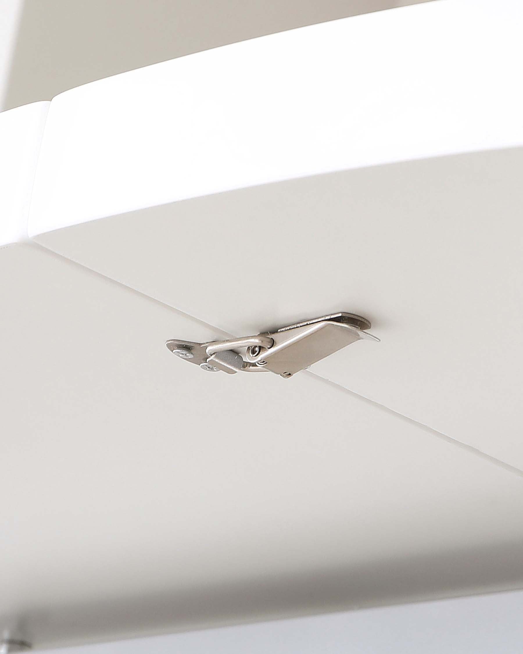 Table de salle à manger ronde extensible Curva blanche brillante 4 à 6 places