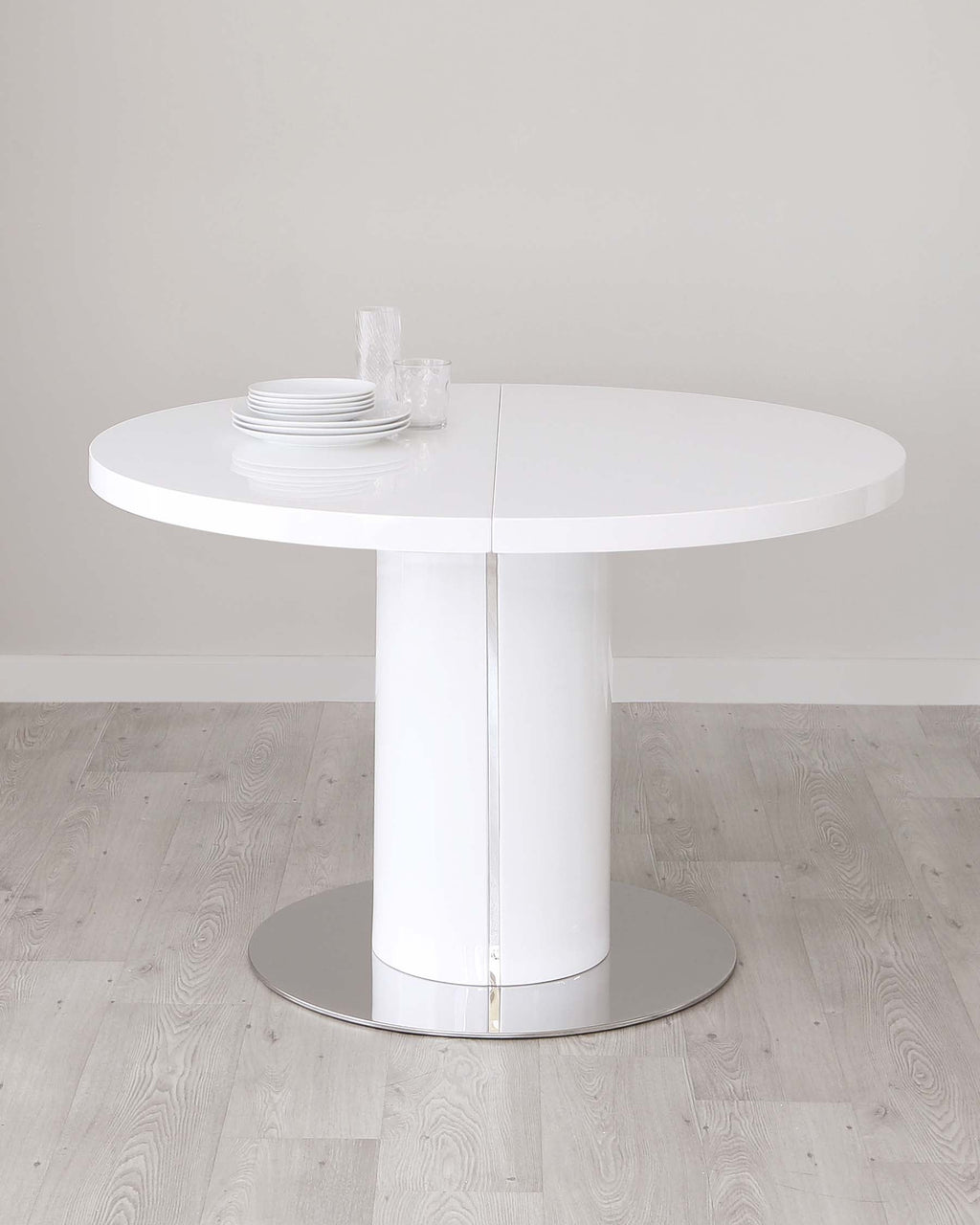 Table de salle à manger ronde extensible Curva blanche brillante 4 à 6 places