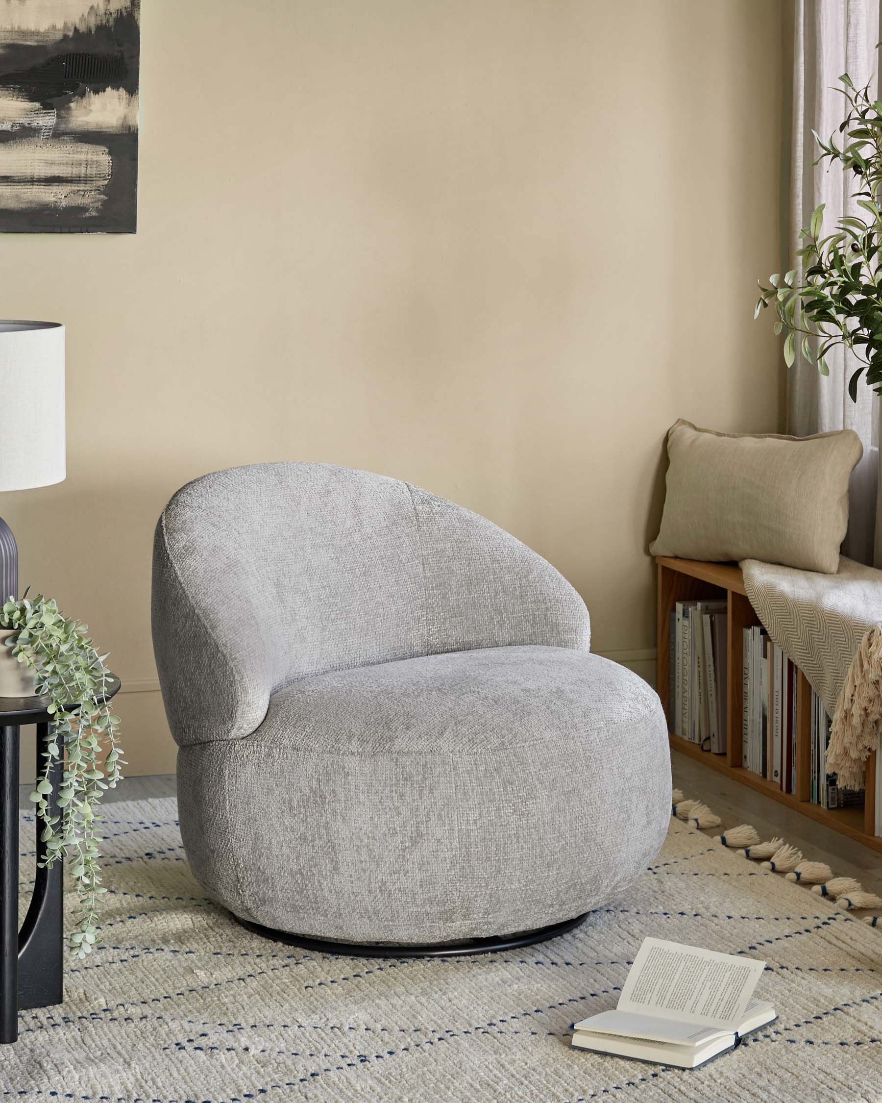 Fauteuil pivotant Daphne en tissu gris clair