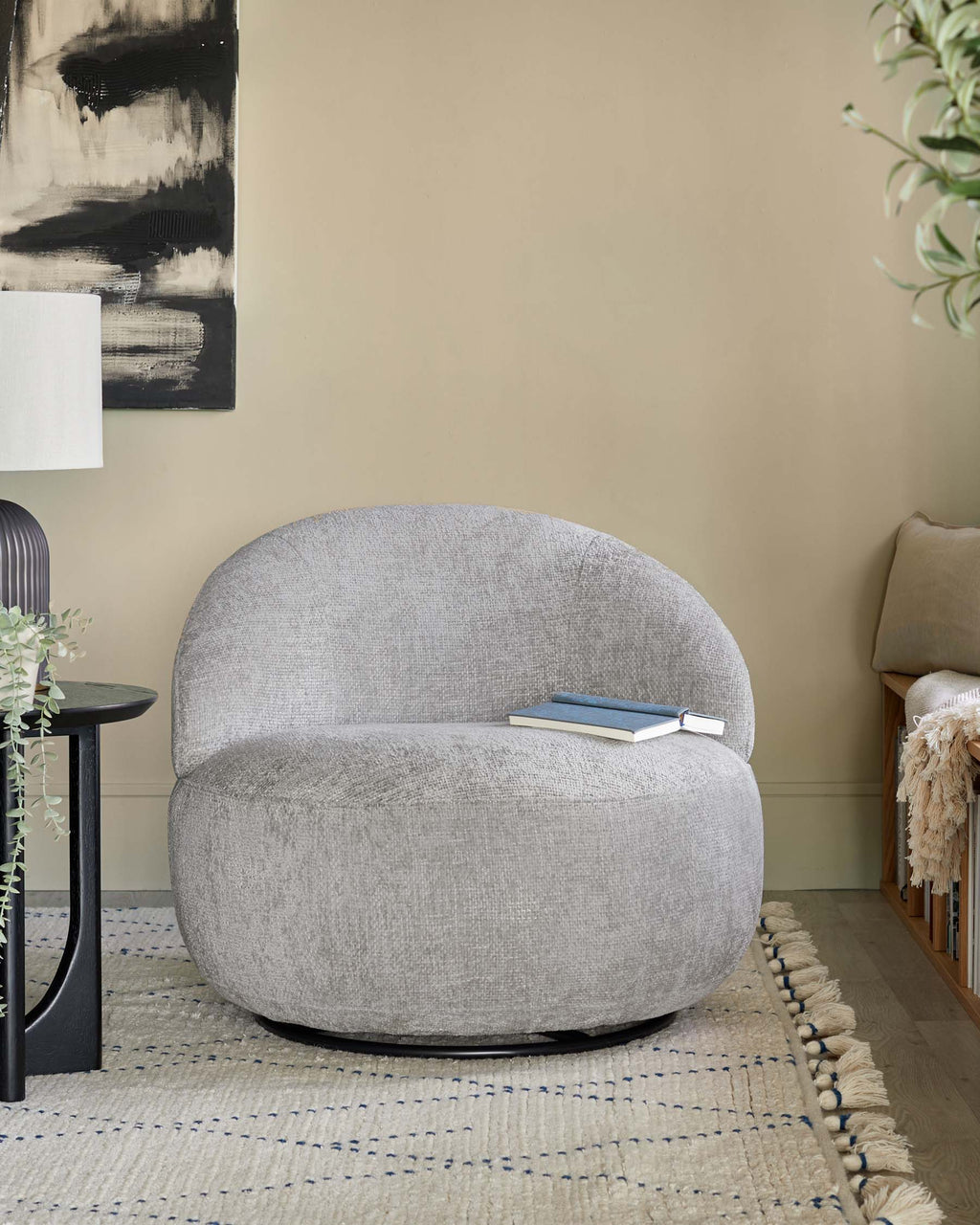 Fauteuil pivotant Daphne en tissu gris clair
