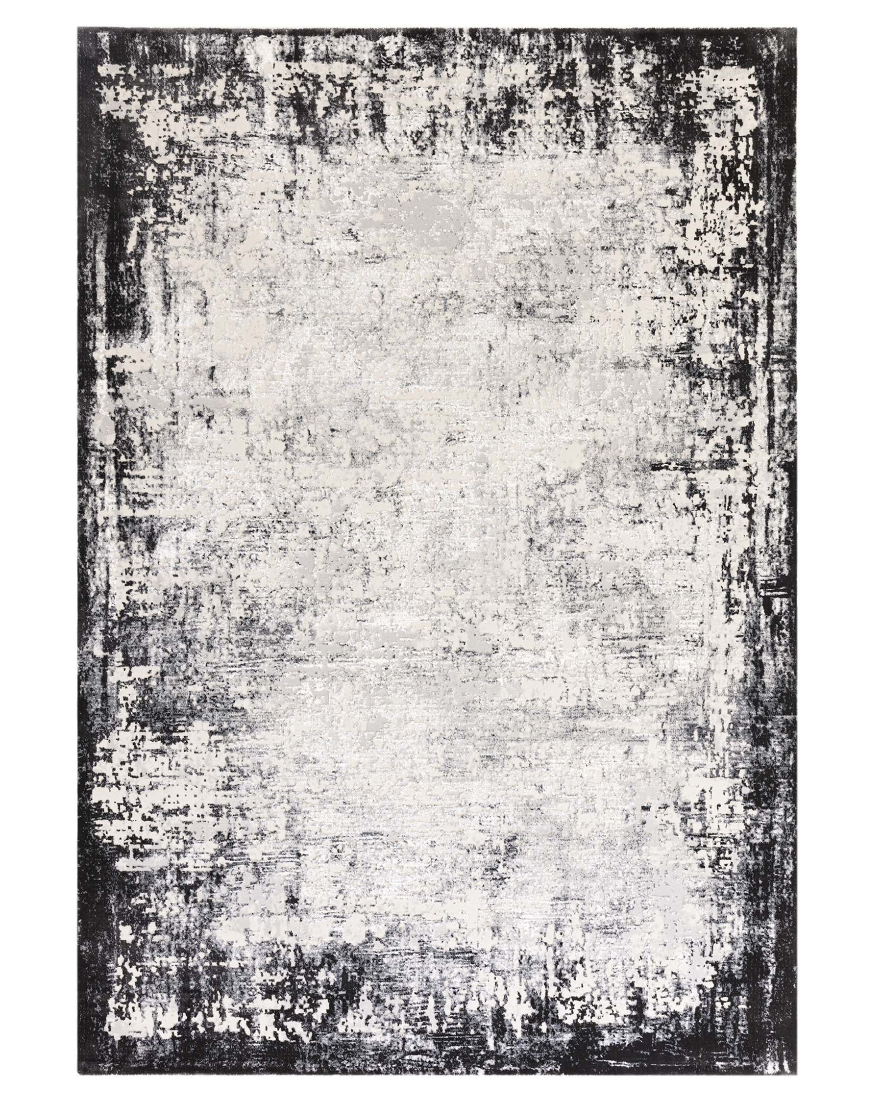 Petit tapis texturé gris foncé à bordure vieillie