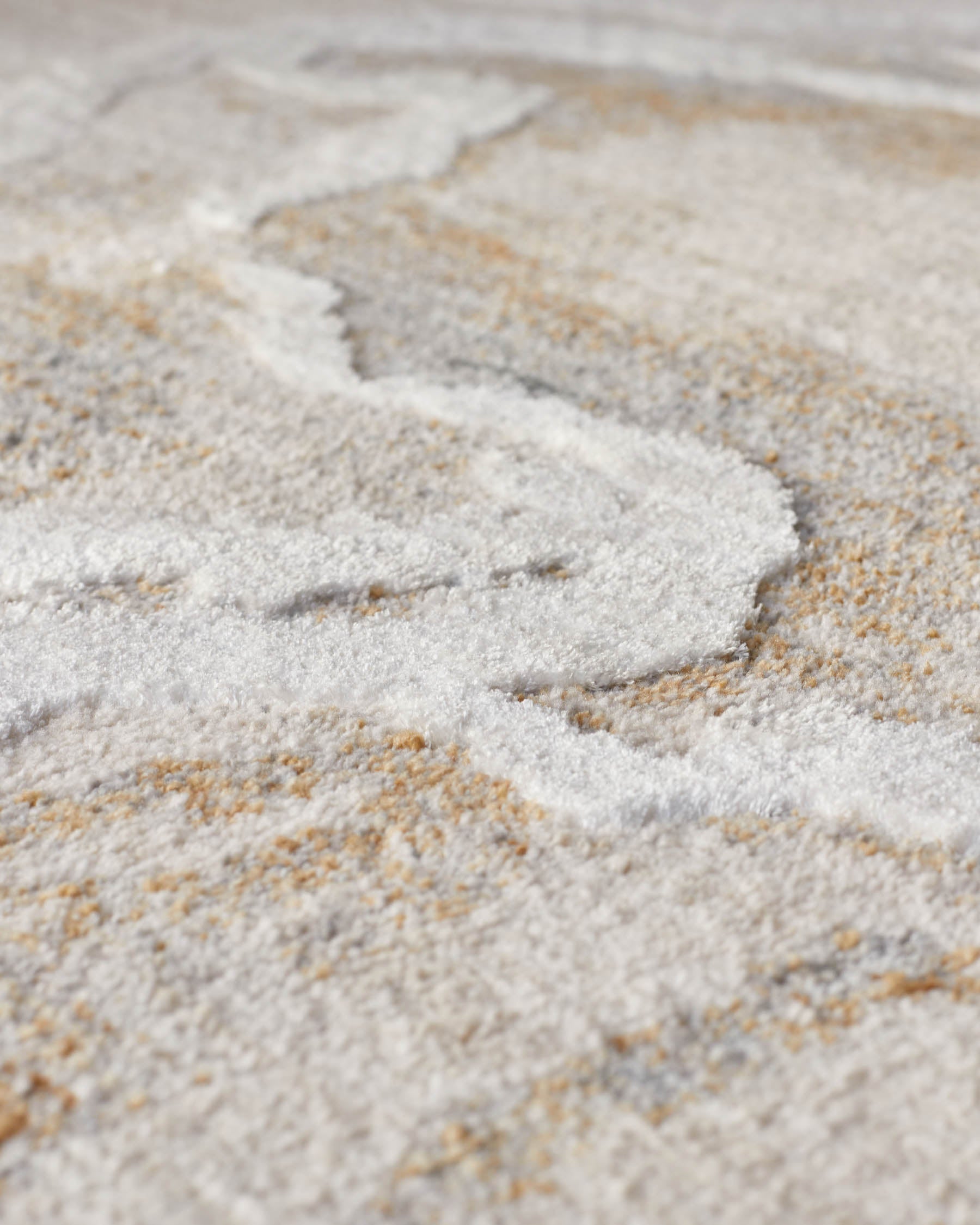 Tapis Eden grand format à texture argentée douce