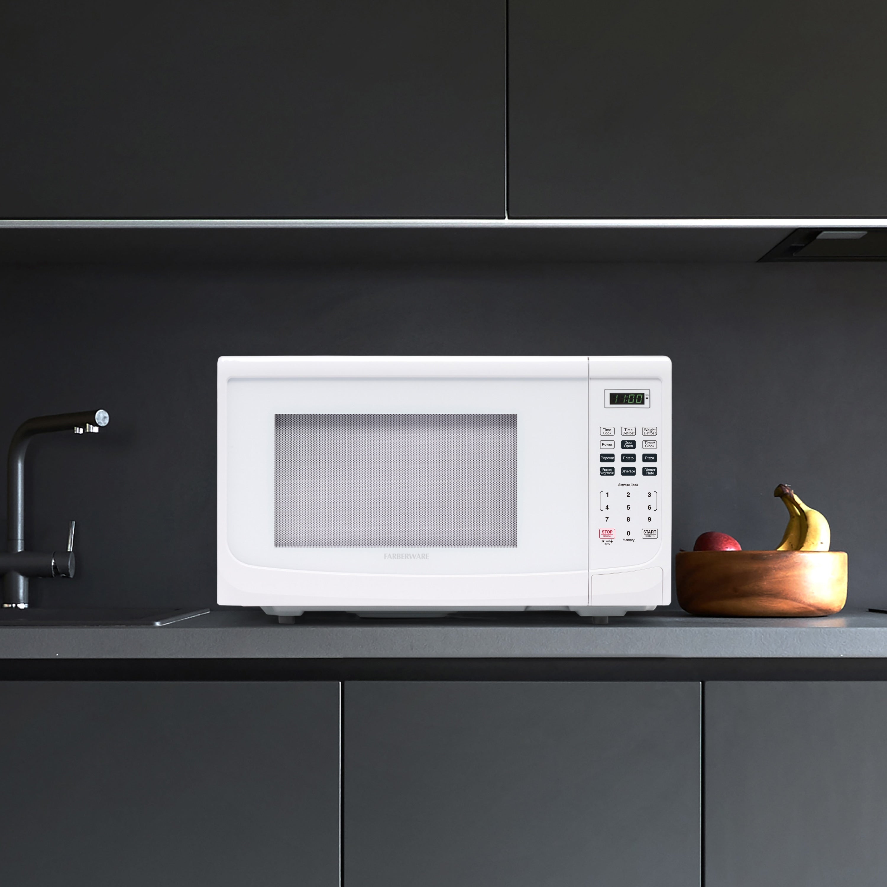 Four à micro-ondes de comptoir Farberware de 1 000 W et 1,1 pi³ avec éclairage LED et verrouillage enfant