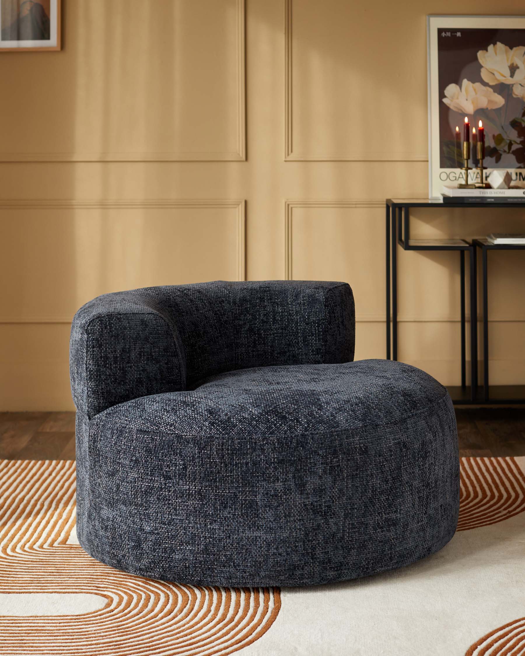 Fauteuil pivotant Gianna en tissu bleu foncé tissé