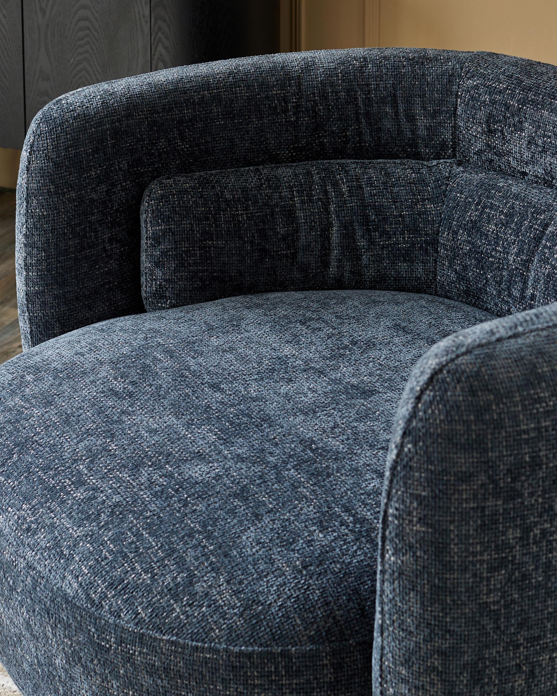 Canapé pivotant deux places Henry bleu foncé à grosses mailles