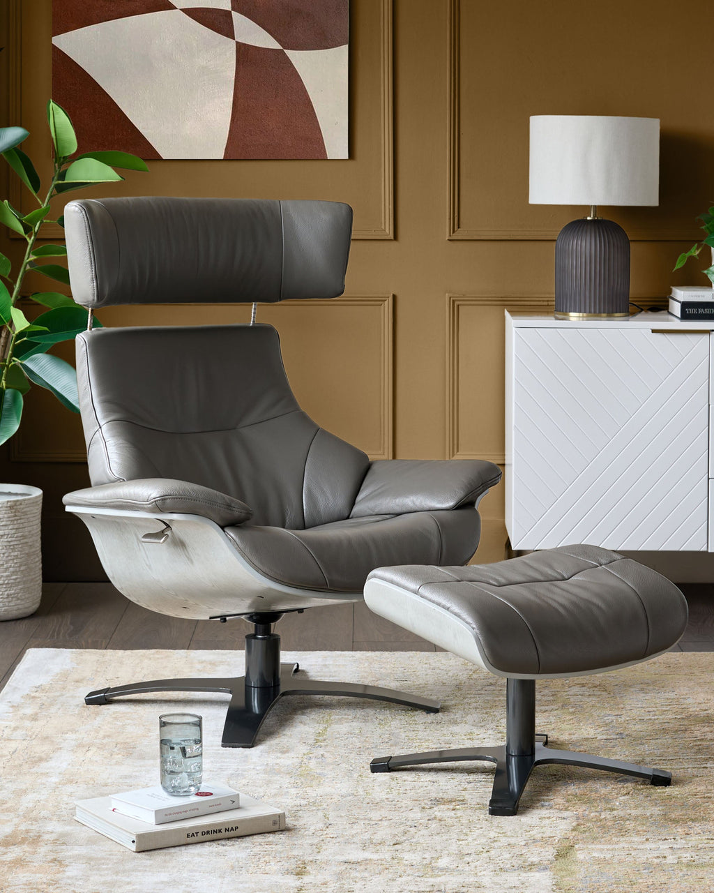 Fauteuil inclinable pivotant Karma en cuir gris foncé avec repose-pieds