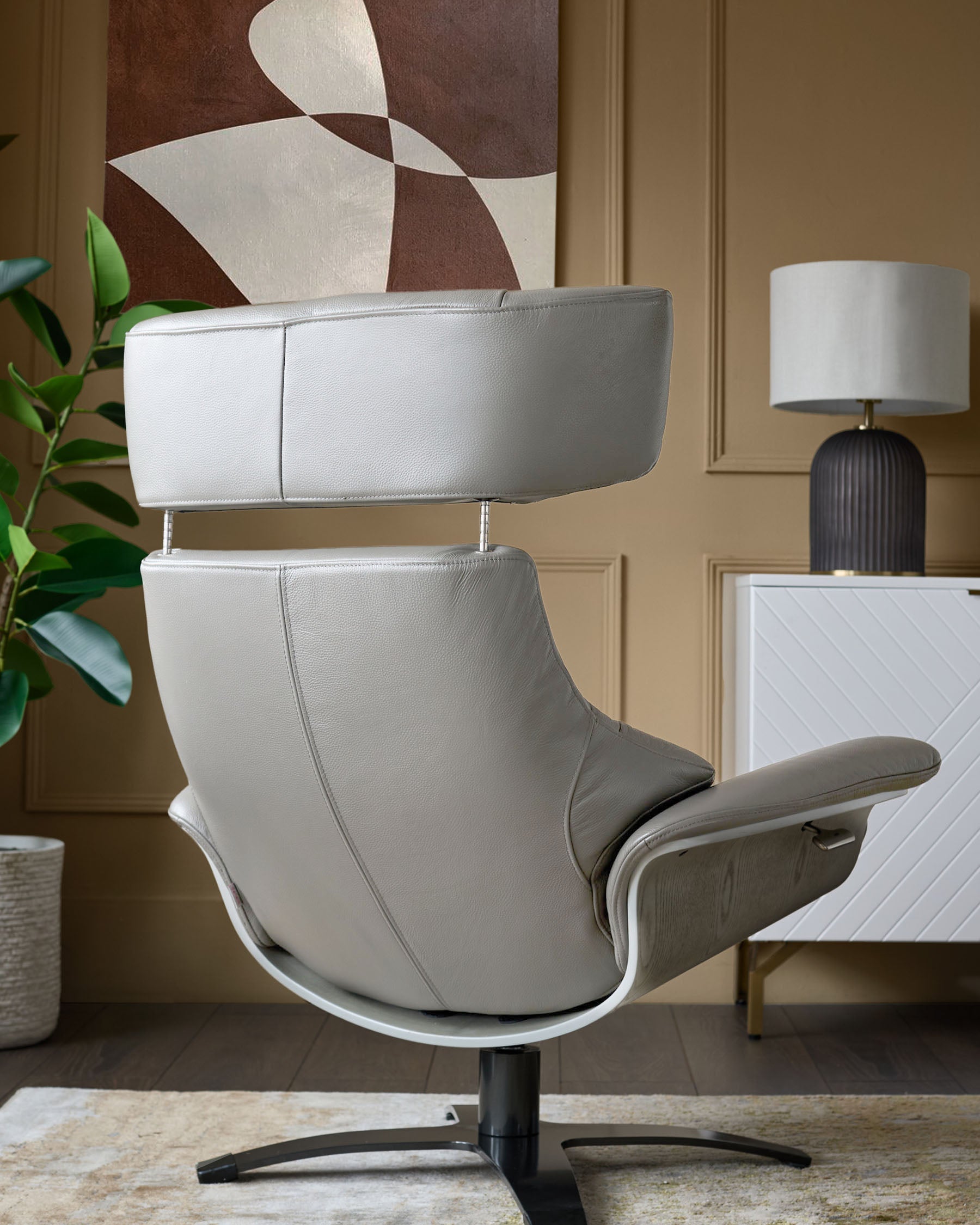 Fauteuil inclinable pivotant et repose-pieds Karma en cuir gris naturel