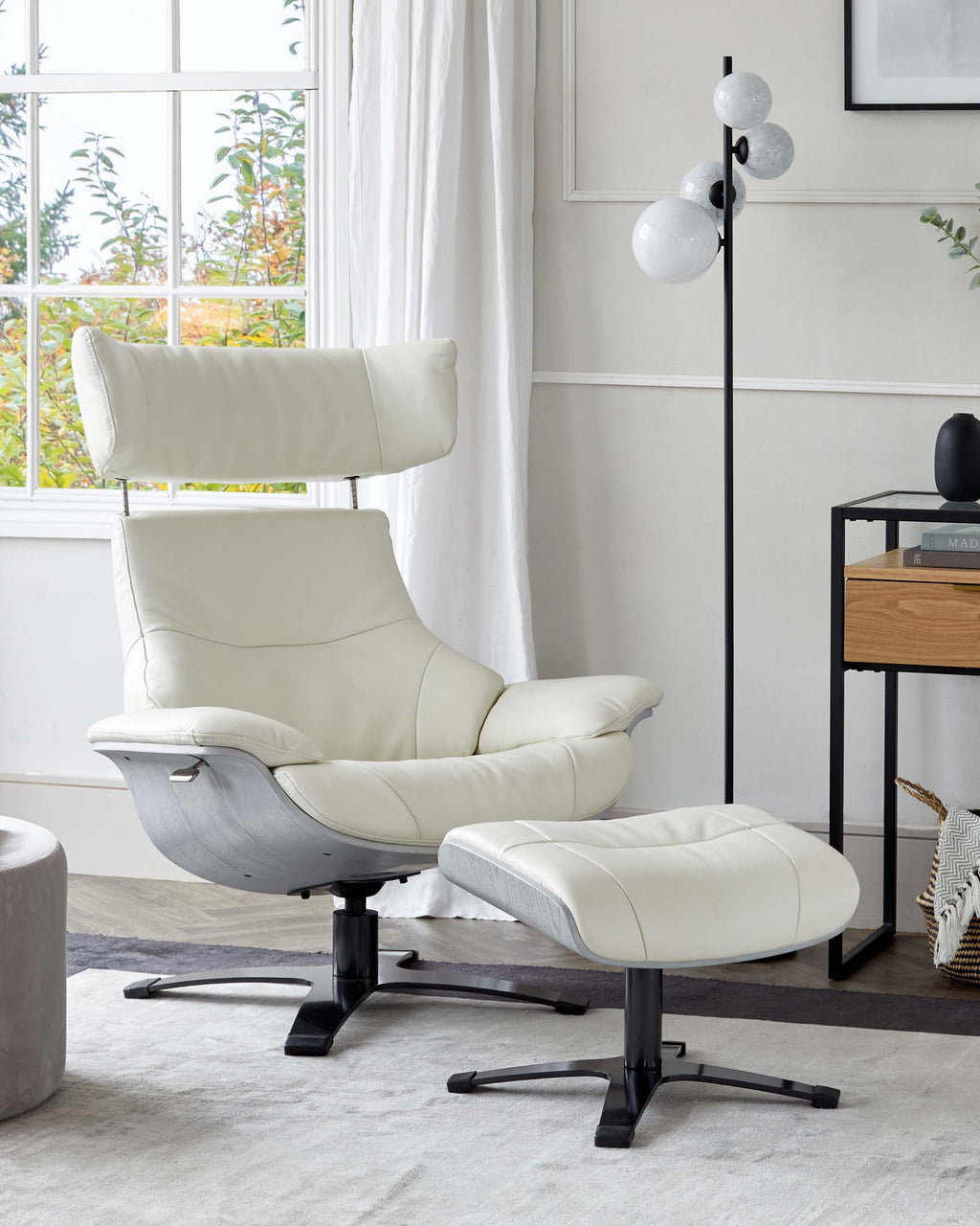 Fauteuil inclinable pivotant Karma en cuir blanc avec repose-pieds