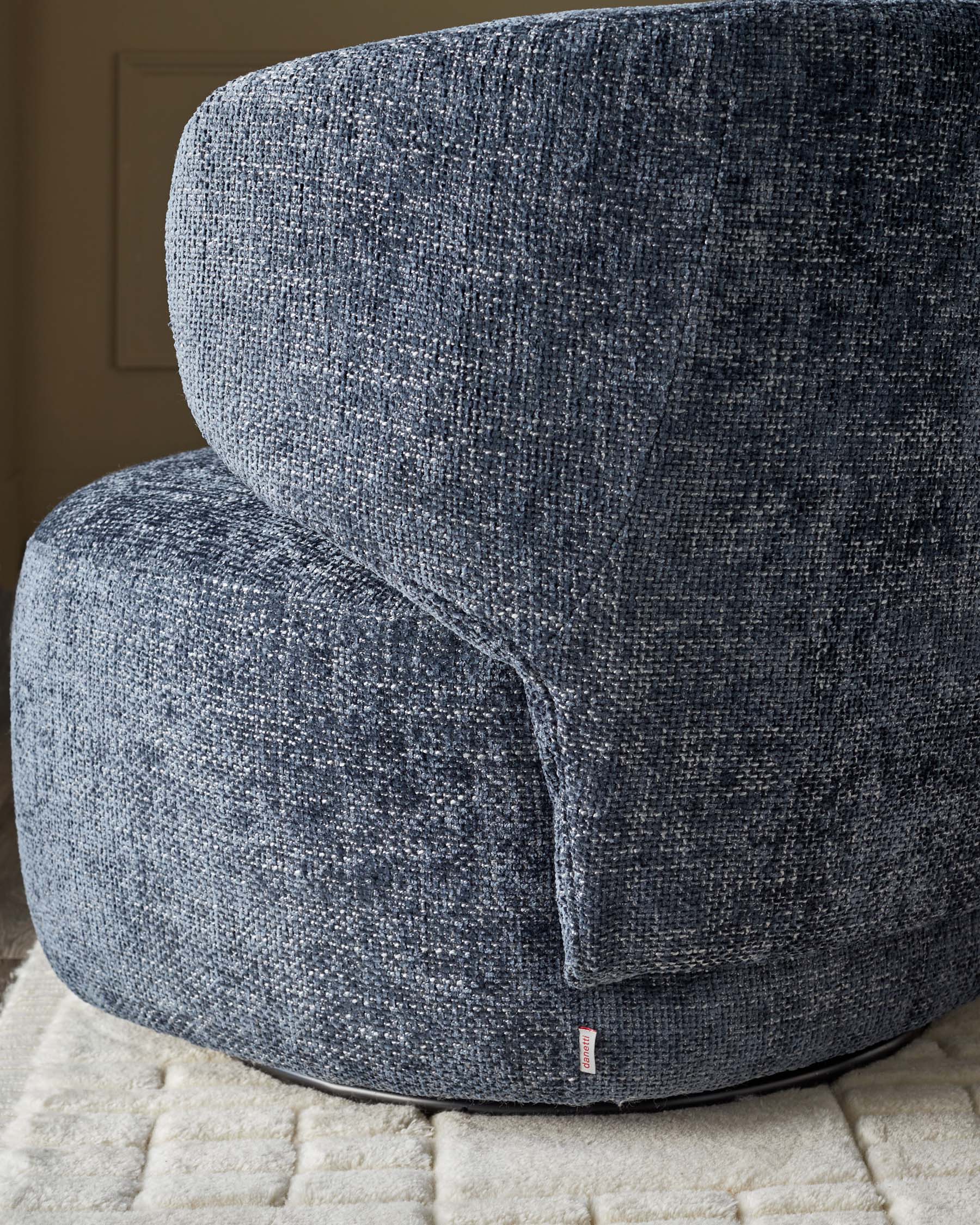 Fauteuil pivotant Landon en tissu bleu foncé