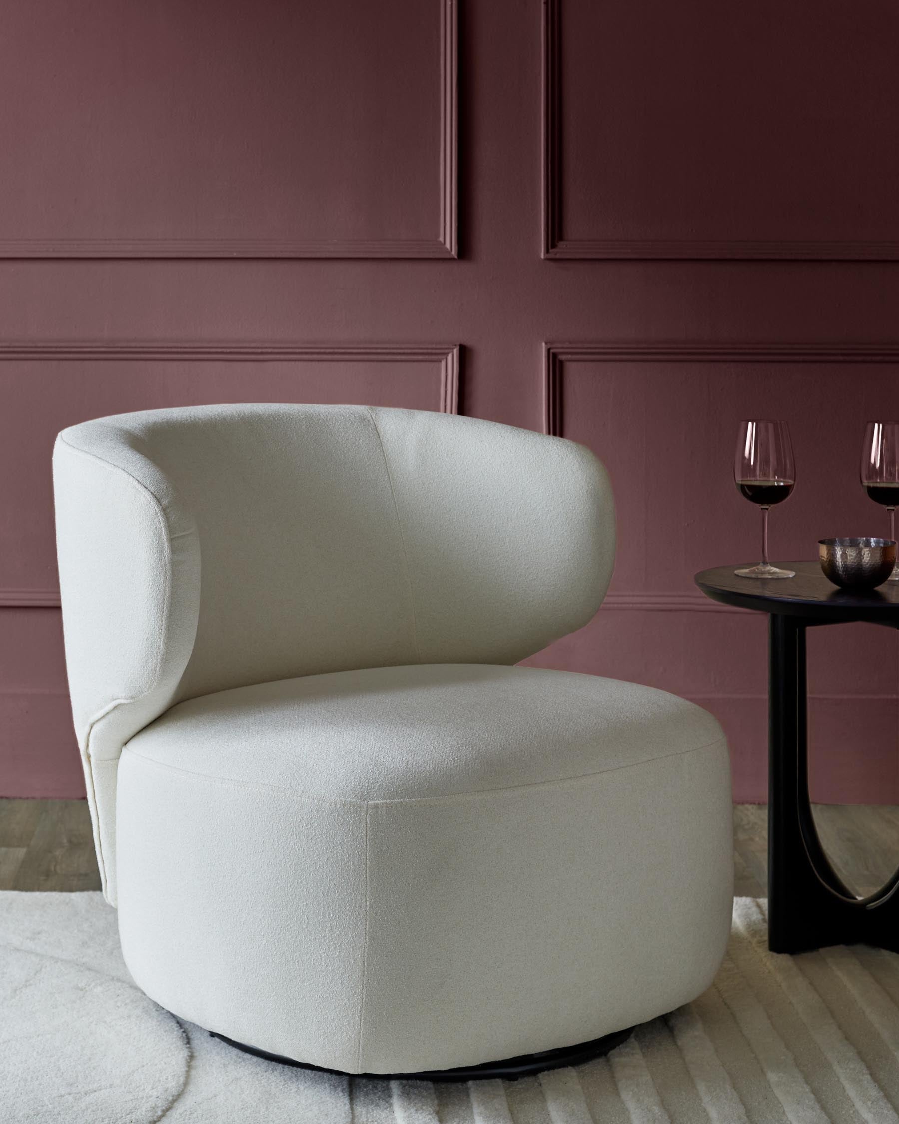 Fauteuil pivotant Landon en bouclette ivoire