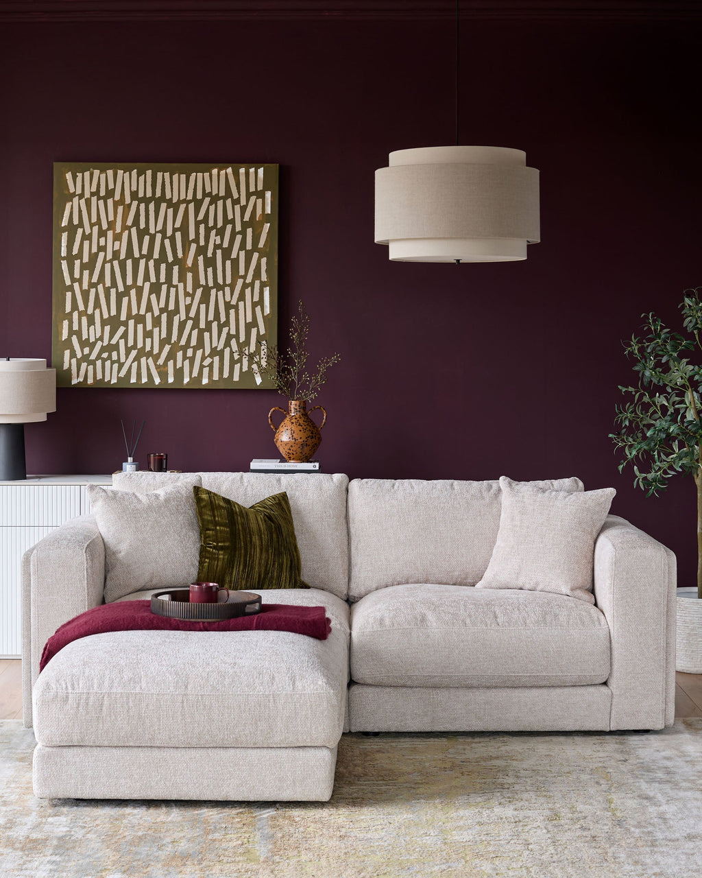 Canapé 3 places Lynetta en tissu naturel avec repose-pieds