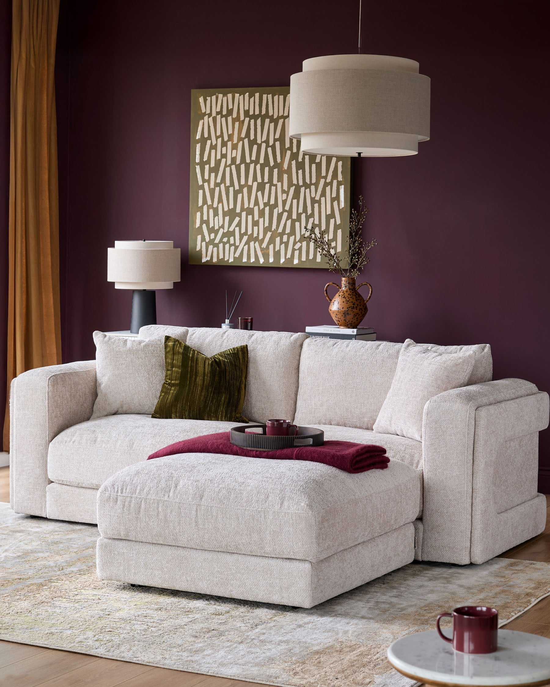 Canapé 3 places Lynetta en tissu naturel avec repose-pieds