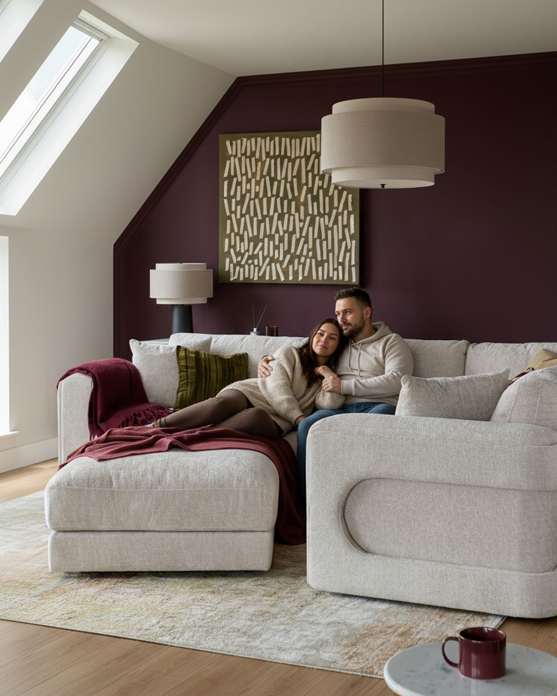 Petit canapé d'angle Lynetta en tissu naturel avec repose-pieds