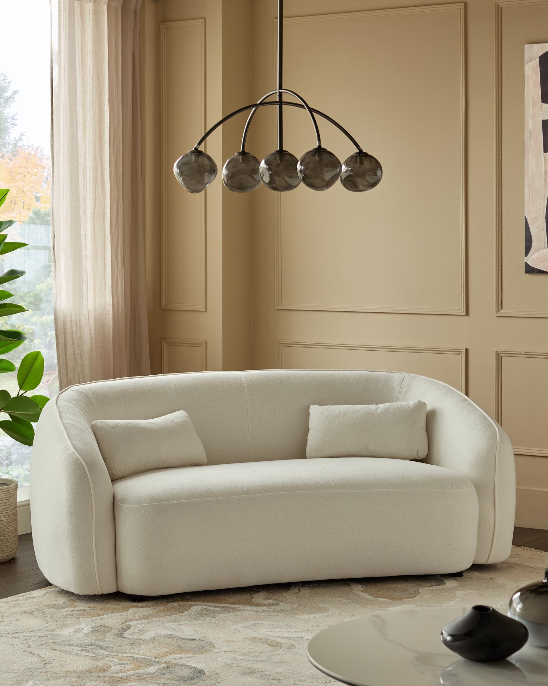 Canapé 2 places Zoey en tissu bouclé ivoire