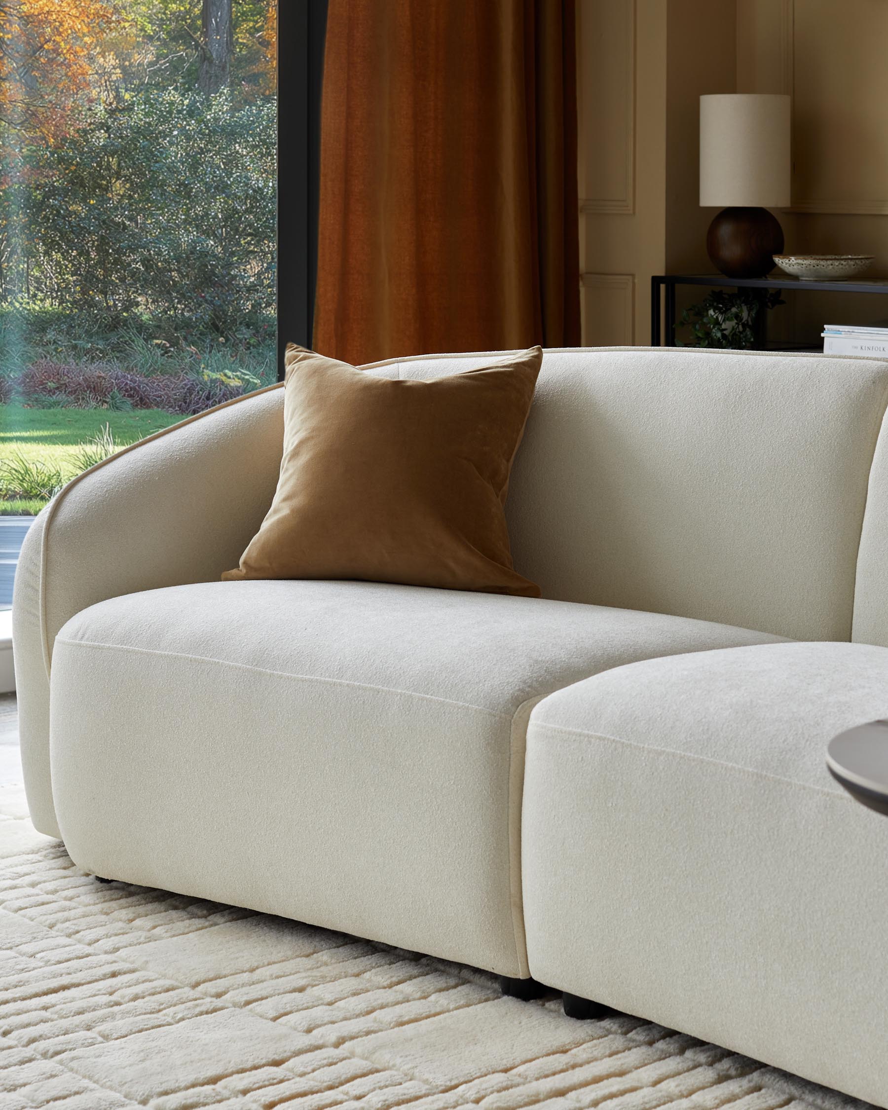 Canapé 3 places Zoey en tissu bouclé ivoire